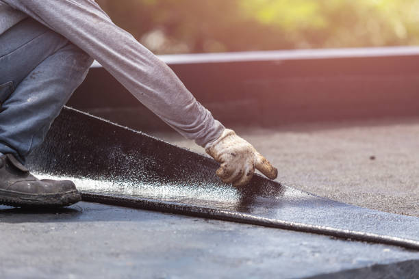 Professional Basement Waterproofing technician working in Three Rivers, OR